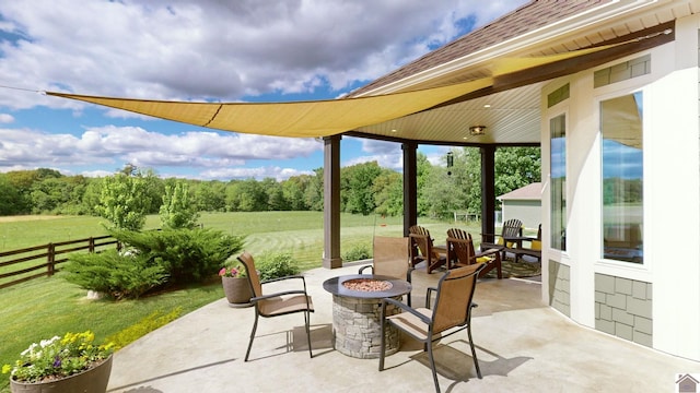 view of patio featuring an outdoor fire pit