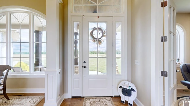 foyer with plenty of natural light