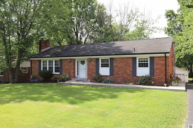 ranch-style house featuring a front lawn