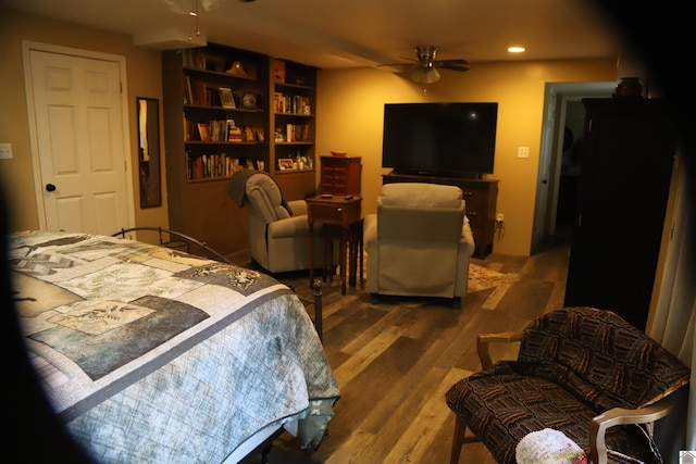 bedroom with hardwood / wood-style flooring