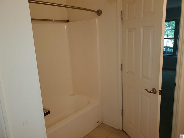 bathroom with tile patterned flooring and shower / bathing tub combination