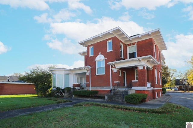 view of front of house with a front yard