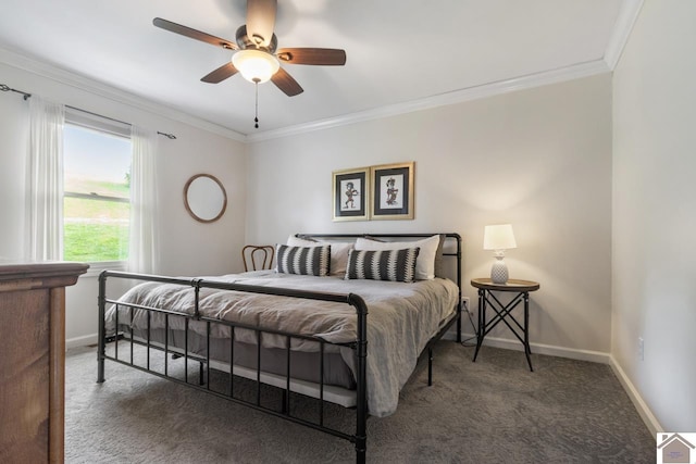 bedroom featuring dark colored carpet, ceiling fan, and crown molding