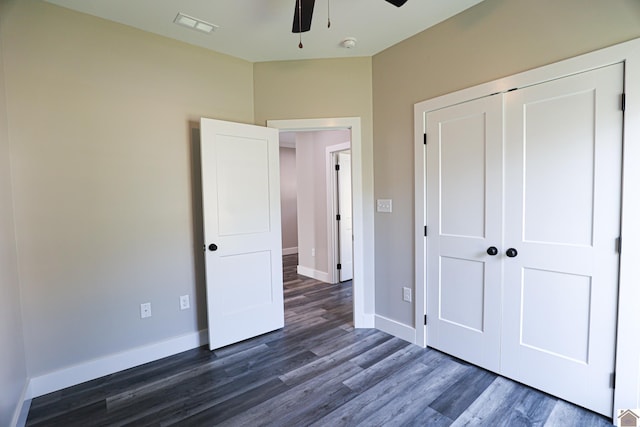3275 Sandpiper Cir, Paducah, KY 42001 - unfurnished bedroom featuring baseboards, visible vents, a closet, and dark wood-style flooring
