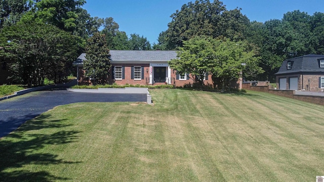 view of front of house with a front lawn