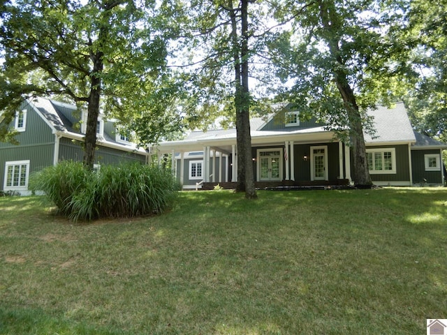 view of front of home featuring a front lawn and covered porch