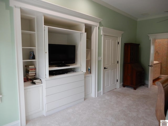 unfurnished bedroom featuring ornamental molding and light colored carpet