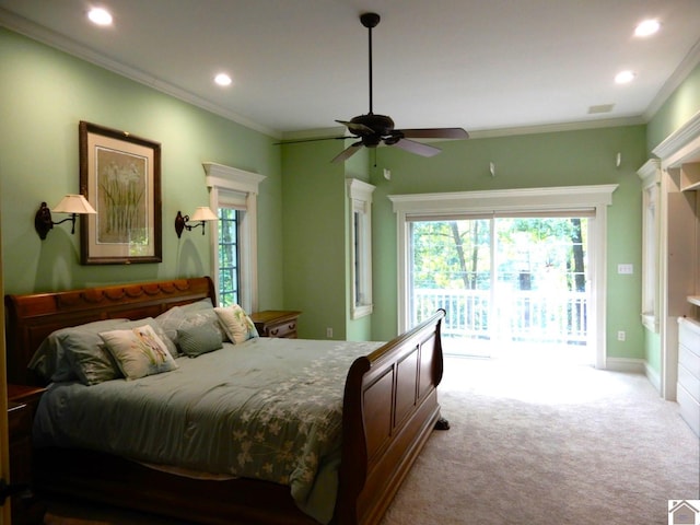 carpeted bedroom with ceiling fan, access to exterior, and crown molding