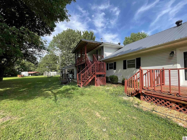 view of yard with a deck