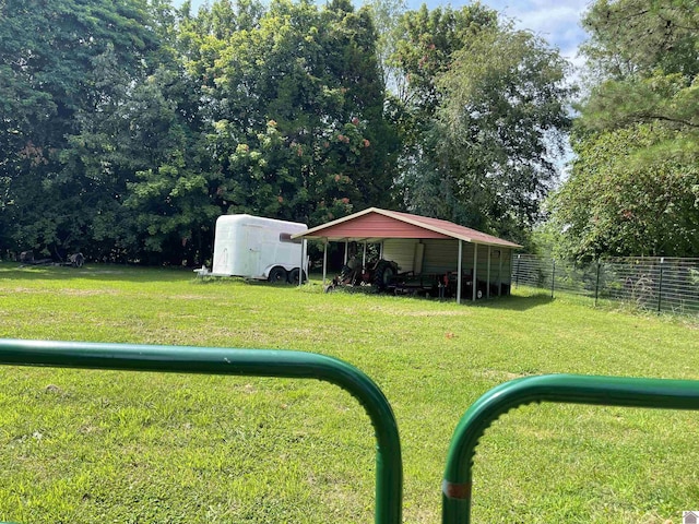 view of yard with a carport