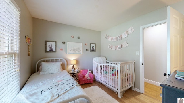 bedroom featuring light wood-type flooring