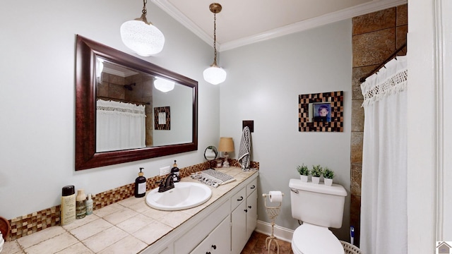 bathroom with vanity, curtained shower, toilet, and crown molding