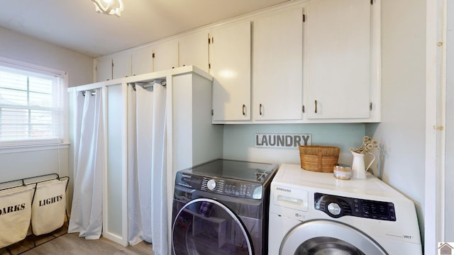 washroom featuring independent washer and dryer