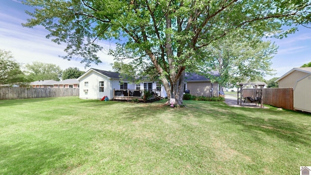 view of yard featuring a deck