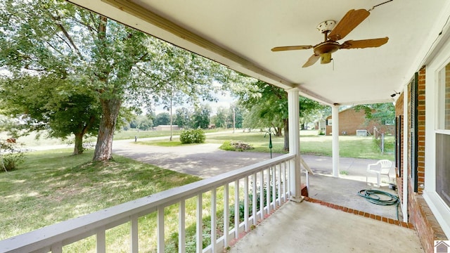 view of patio / terrace featuring ceiling fan and a porch