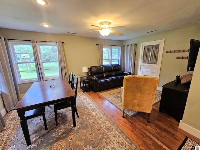 dining room featuring hardwood / wood-style flooring and ceiling fan