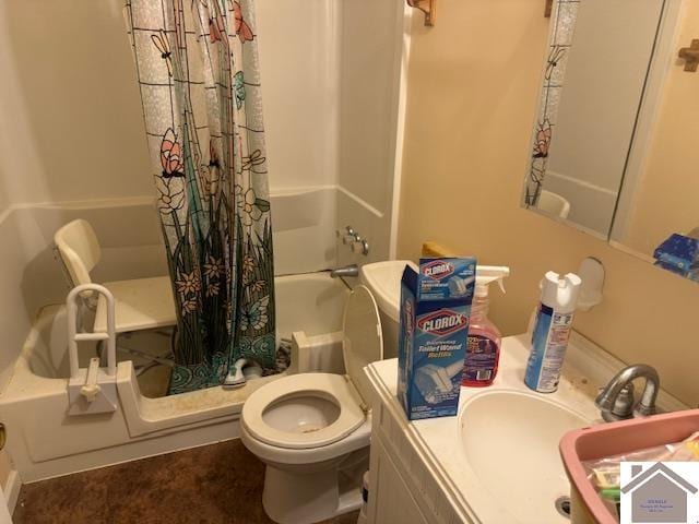 full bathroom with shower / bath combo with shower curtain, toilet, vanity, and tile patterned flooring