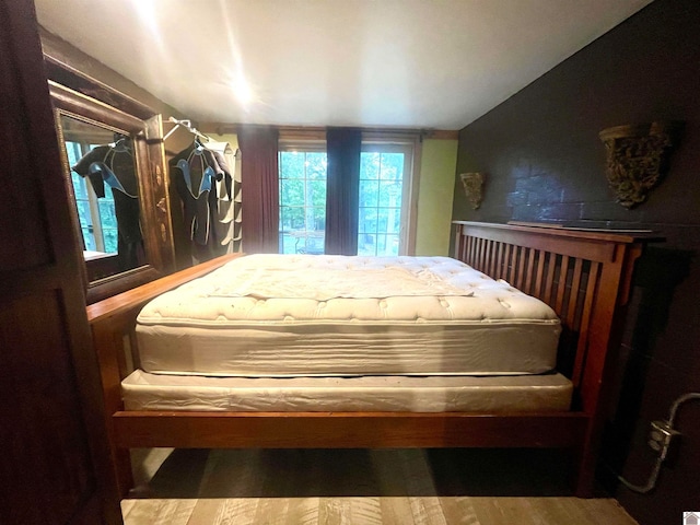 bedroom featuring hardwood / wood-style floors