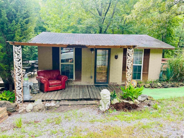 view of front of house with a wooden deck