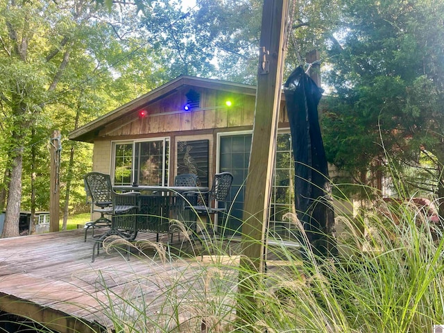 exterior space featuring a wooden deck