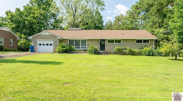 ranch-style home with a front lawn and a garage