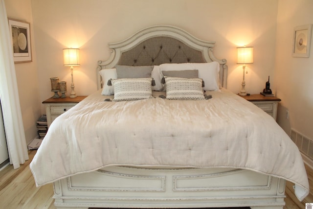 bedroom featuring light hardwood / wood-style floors