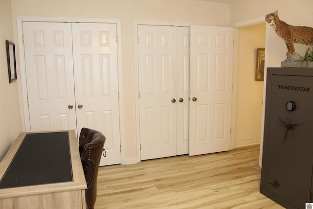 office space with light hardwood / wood-style floors