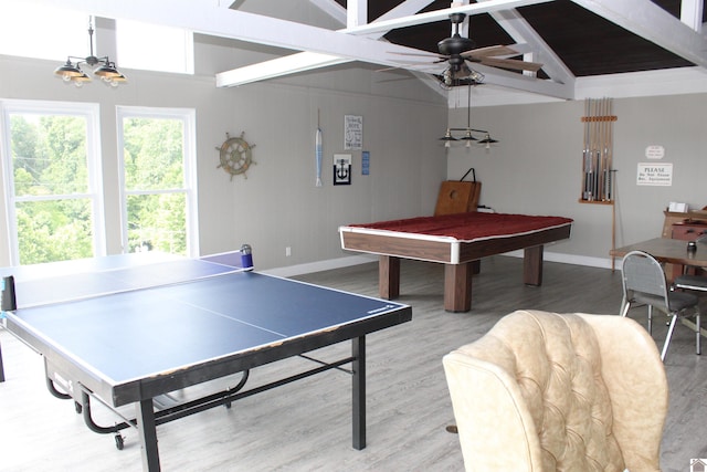 recreation room featuring ceiling fan, light hardwood / wood-style flooring, billiards, and vaulted ceiling with beams