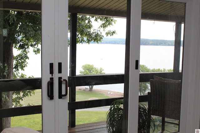 interior space with a water view