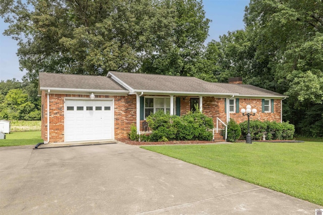 ranch-style home with a garage and a front yard