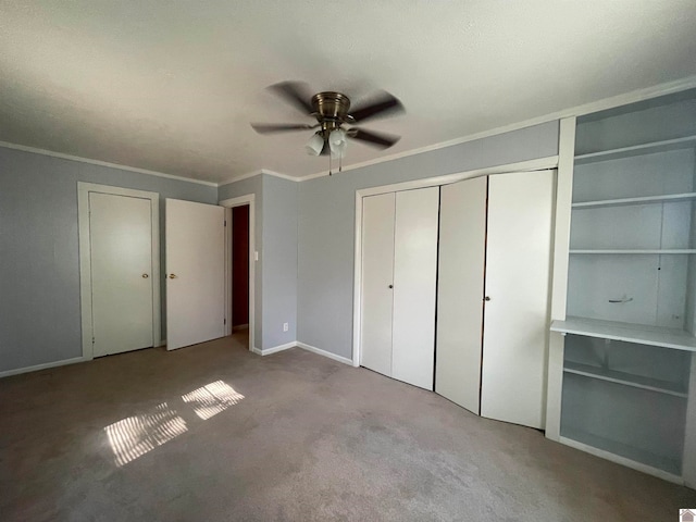 unfurnished bedroom featuring light carpet, ornamental molding, and ceiling fan