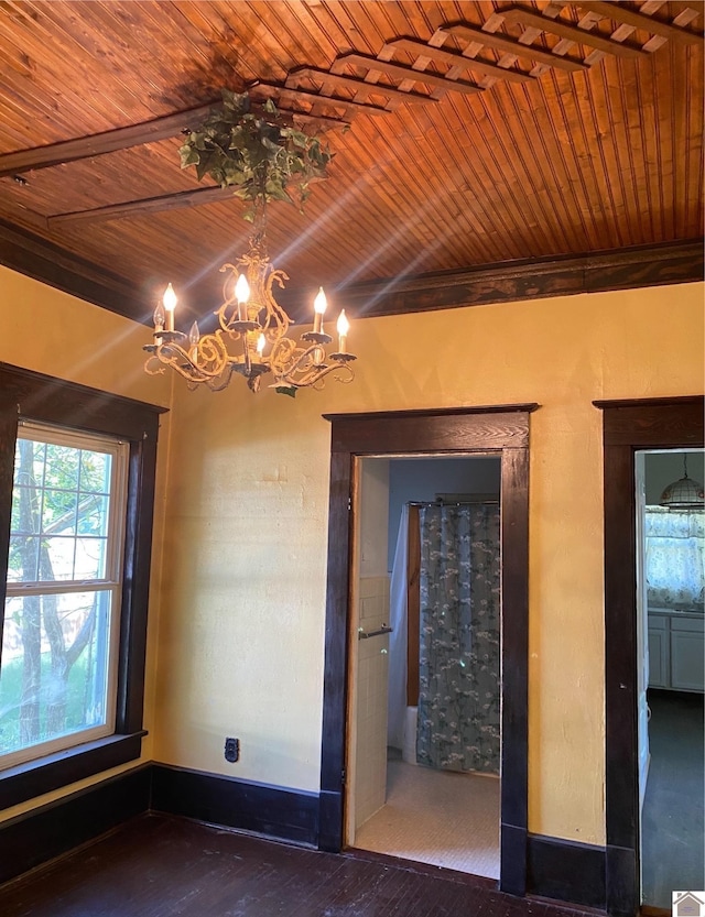 unfurnished dining area with a chandelier, wooden ceiling, and wood-type flooring