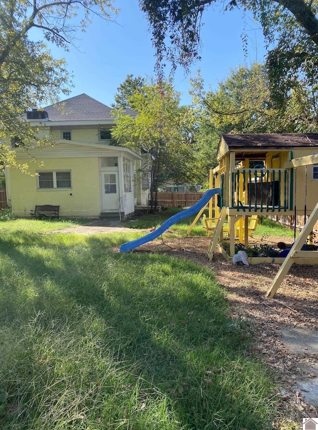 view of jungle gym with a yard