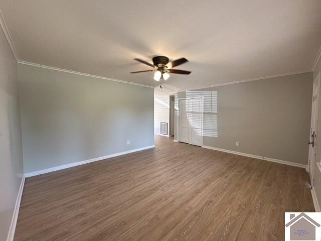 interior space featuring crown molding, hardwood / wood-style floors, and ceiling fan