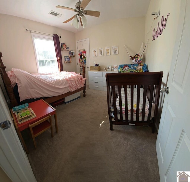 carpeted bedroom with ceiling fan