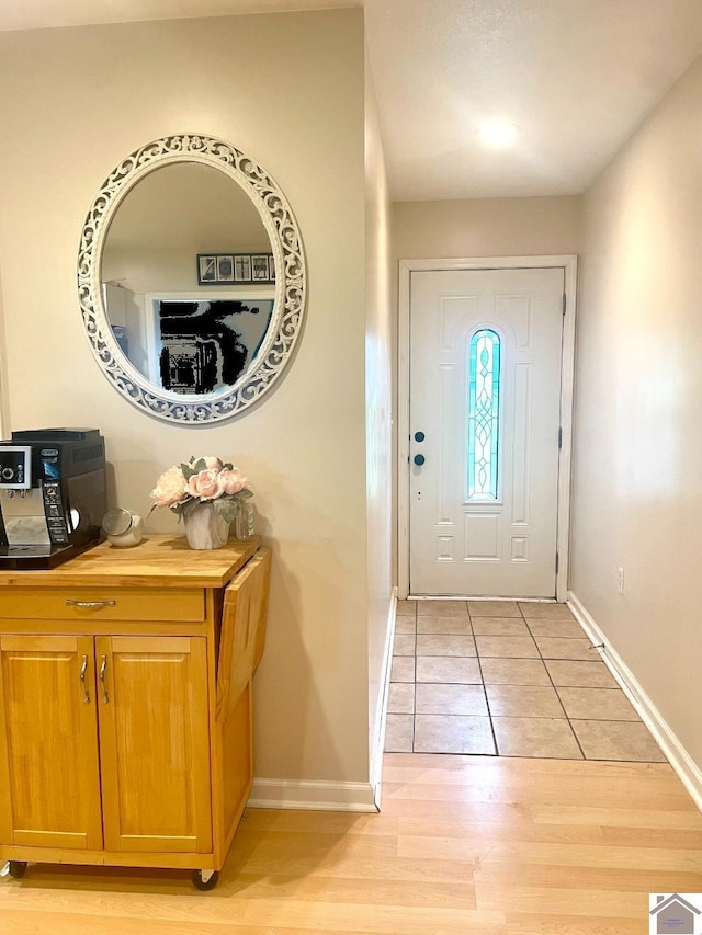 entrance foyer featuring light hardwood / wood-style floors