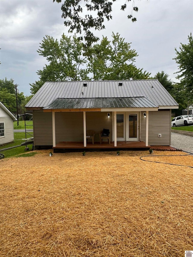 exterior space featuring a front lawn