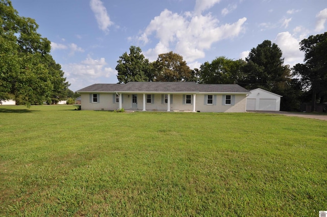 exterior space with a garage and a lawn