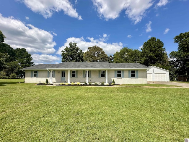 ranch-style home with a garage, an outdoor structure, and a front lawn