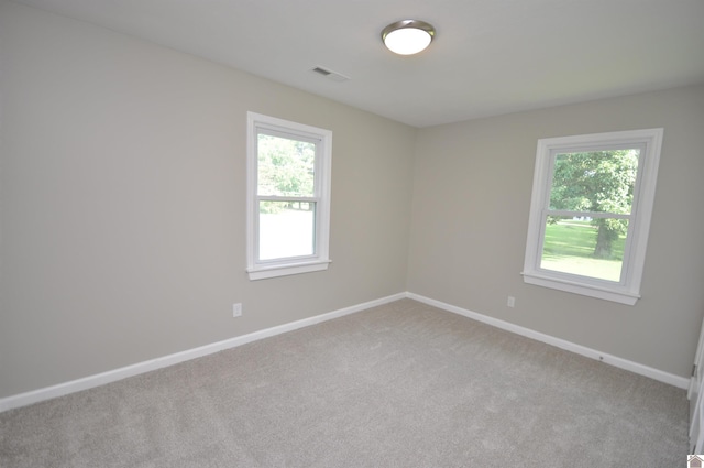 view of carpeted spare room