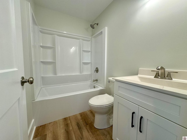 full bathroom featuring toilet, bathtub / shower combination, vanity, and wood-type flooring