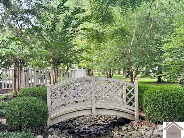 view of gate with fence