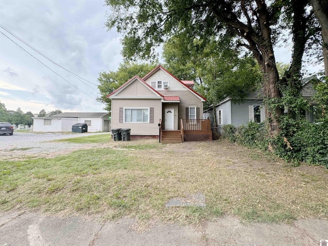 view of front of house with a front yard