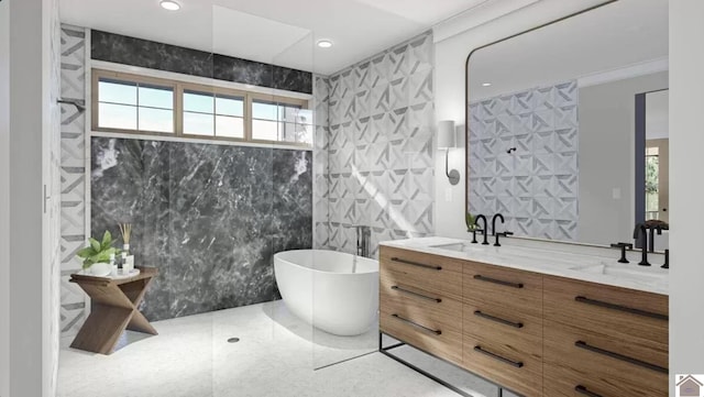 bathroom featuring double vanity, tile walls, and a bathing tub