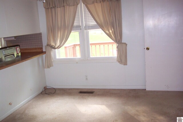 empty room with carpet floors