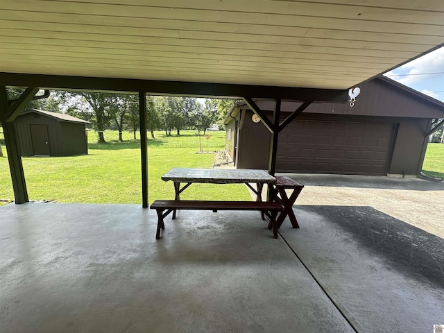 view of patio featuring a storage unit