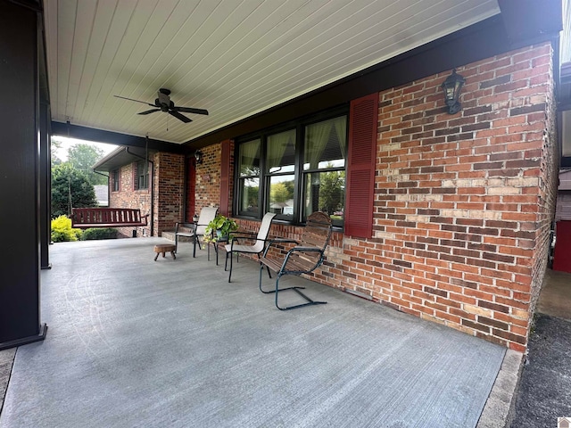 view of patio featuring ceiling fan