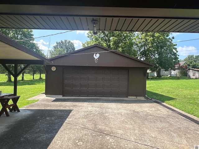 garage with a yard