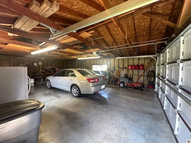 garage with white fridge