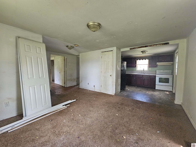 unfurnished living room with sink